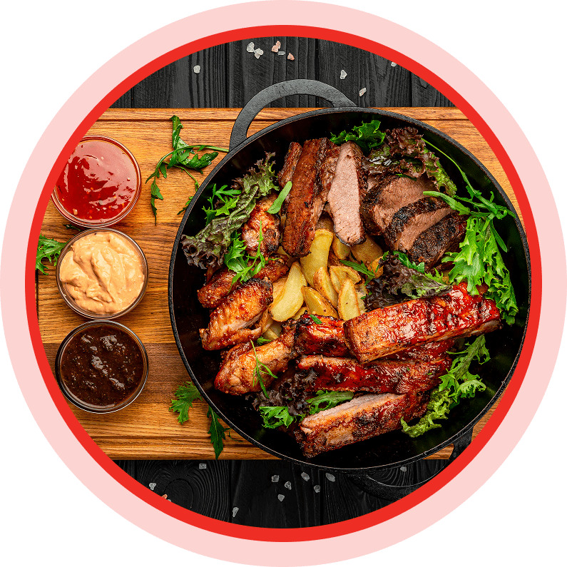 Assorted grilled meats with sauces and greens.